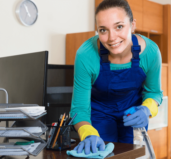 A happy Office cleaning expert at her job