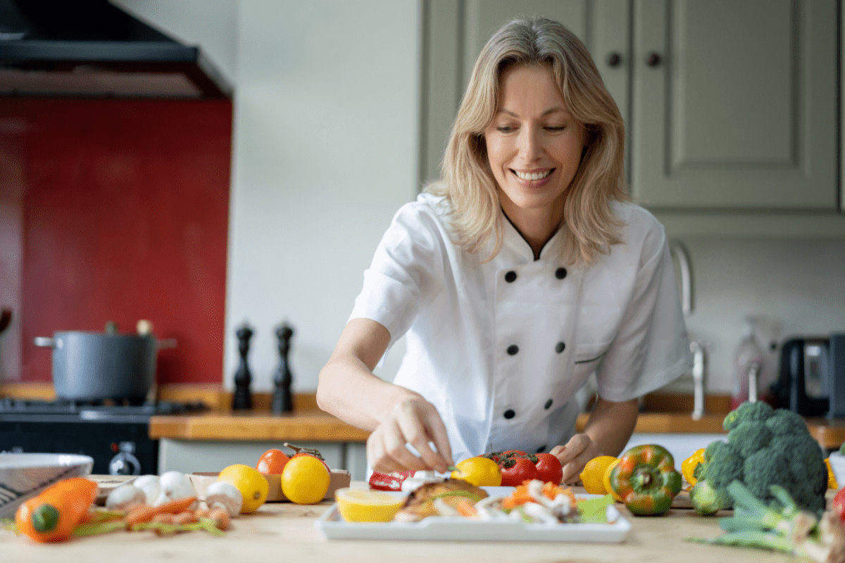 Personal chef in the kitchen cooking a healthy meal at home