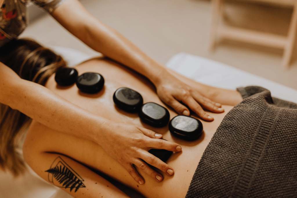 Woman Having a Massage with Massage Stones