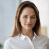 Confident smiling businesswoman looking at camera, young professional headshot portrait