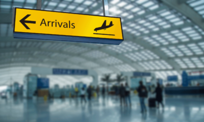 Airport arrivals display used to illustrate the recent decline in Australian migration.