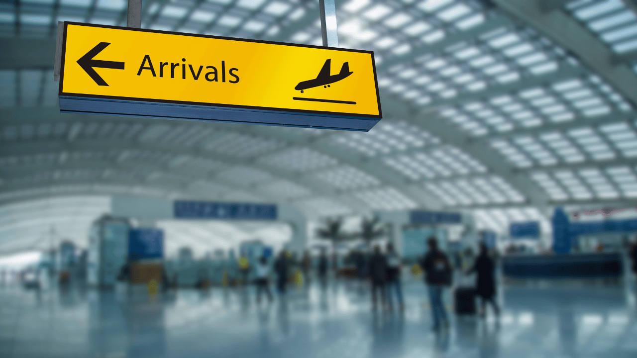 Airport arrivals display used to illustrate the recent decline in Australian migration.