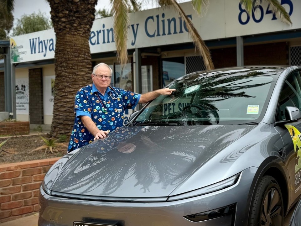 Dr. Melville-Smith with his Tesla Model Y outside Whyalla Veterinary Clinic