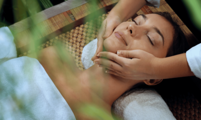 Client receiving a professional face massage in a serene spa setting