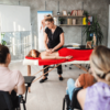 Female massage therapist learning students everything about massage and human body