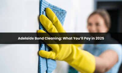 Gloved hand wiping wall with cloth, illustrating end-of-lease cleaning cost in Adelaide for 2025-26.