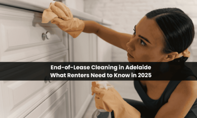Woman cleaning kitchen cabinets during end of lease cleaning in Adelaide