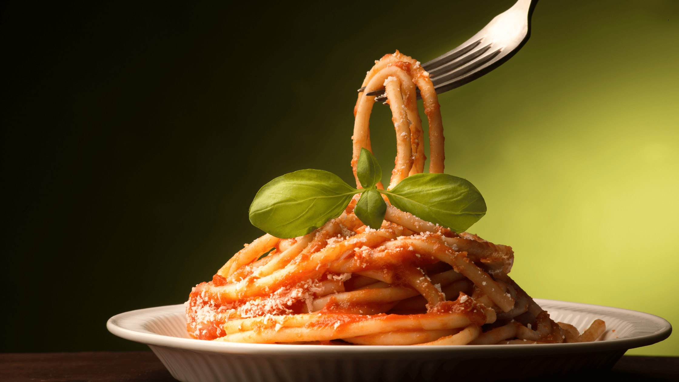 Spaghetti with tomato sauce and basil served at an Itslian Restaurant in Australia