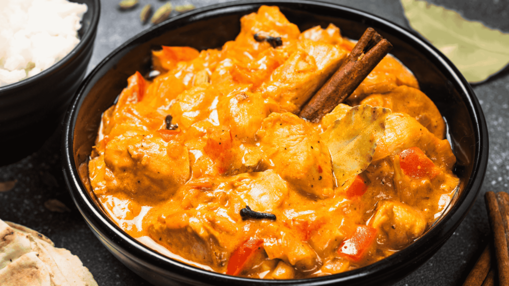 Chicken tikka masala in creamy spiced tomato sauce with Indian spices