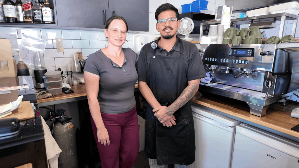 Bec and Karthik, owners of Pizzeria Trieste in Port Lincoln, standing inside the restaurant.
